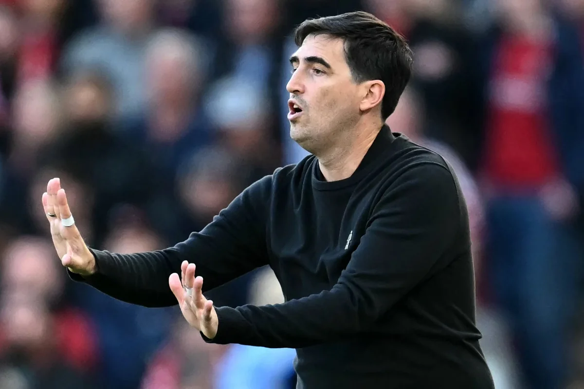 Liverpool's Spanish head coach Andoni Iraola gestures on the touchline during the English Premier League football match between Liverpool and Manchester City at Anfield in Liverpool, north west England on October 11, 2026. (Photo by Paul ELLIS / AFP via Getty Images) / RESTRICTED TO EDITORIAL USE. No use with unauthorized audio, video, data, fixture lists, club/league logos or 'live' services. Online in-match use limited to 120 images. An additional 40 images may be used in extra time. No video emulation. Social media in-match use limited to 120 images. An additional 40 images may be used in extra time. No use in betting publications, games or single club/league/player publications. /