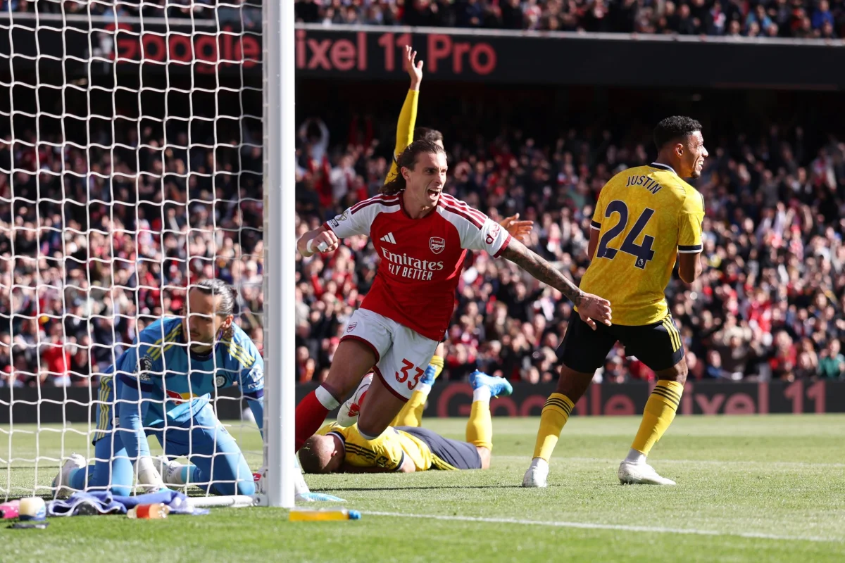 LONDON, ENGLAND - OCTOBER 10: Riccardo Calafiori of Arsenal celebrates after scoring a goal to make it 1- during the Premier League 2026/27 match between Arsenal FC and Leeds United at Emirates Stadium on October 10, 2026 in London, England. (Photo by Catherine Ivill - AMA/Getty Images)