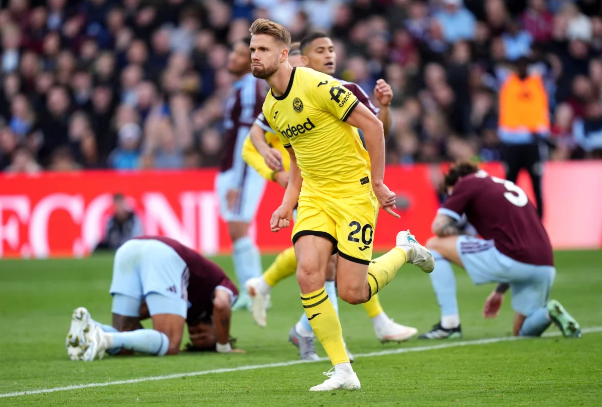 Brentford's Kristoffer Ajer (centre) celebrates scoring their side's second goal of the game during the Premier League match at Villa Park, Birmingham. Picture date: Saturday October 10, 2026. PA Photo. Photo credit should read: Nick Potts/PA Wire. RESTRICTIONS: EDITORIAL USE ONLY No use with unauthorised audio, video, data, fixture lists, club/league logos or "live" services. Online in-match use limited to 120 images, no video emulation. No use in betting, games or single club/league/player publications.